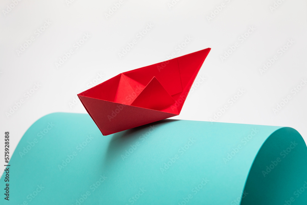 Paper ship on the crest of a paper wave Paper ship on the crest of a paper wave