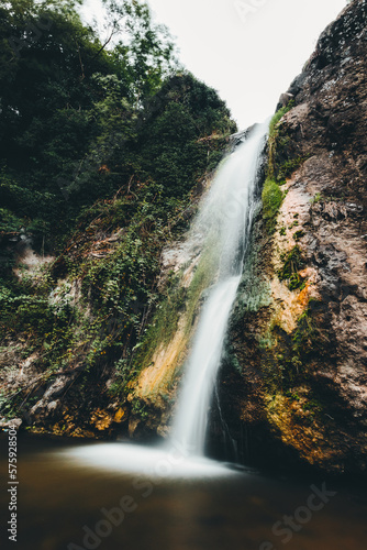 the sound of a roaring waterfall  vertical closeup 