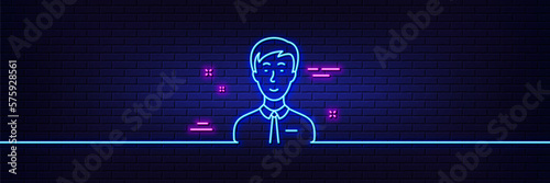 Neon light glow effect. Man line icon. User or businessman person sign. Male silhouette symbol. 3d line neon glow icon. Brick wall banner. Businessman person outline. Vector