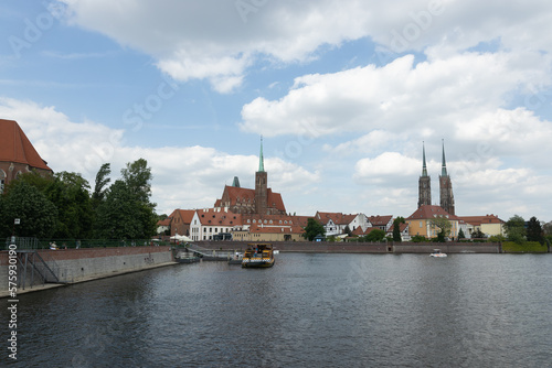 Wroclaw, Poland - May 10, 2022: View of the houses on Tumski Island across the river Odra in Wroclaw. Poland