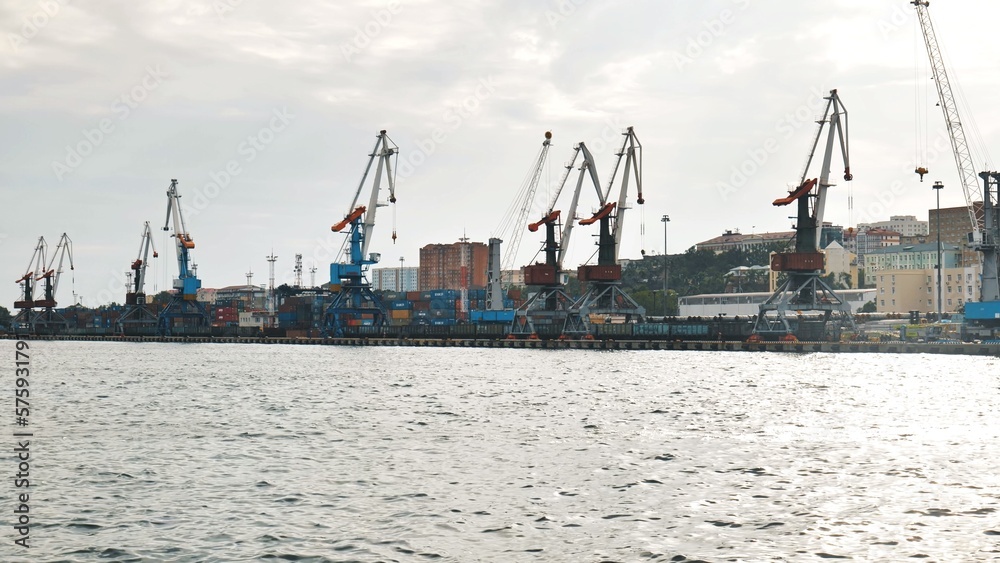 The seaport of Vladivostok with cranes. View from the ferry.