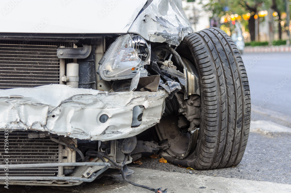 The wreckage of the car was abandoned by roadside The wreckage of the car was abandoned by roadside