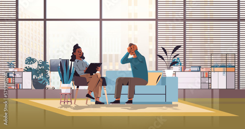 man visiting female psychologist psychotherapist consulting patient during psychotherapy session mental health depression