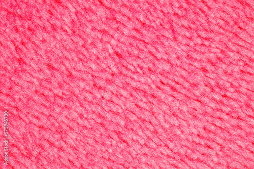 Pink fleecy fibrous surface, background wallpaper, uniform texture pattern