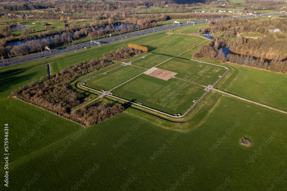 Archaeological historic site in Dutch landscape. Aerial view of outlined remains of roman regiment fortification with clear blueprint of the original Waterlinie defense settlement. 