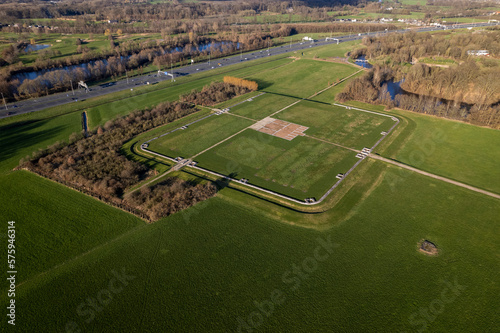 Archaeological historic site in Dutch landscape. Aerial view of outlined remains of roman regiment fortification with clear blueprint of the original Waterlinie defense settlement.  photo