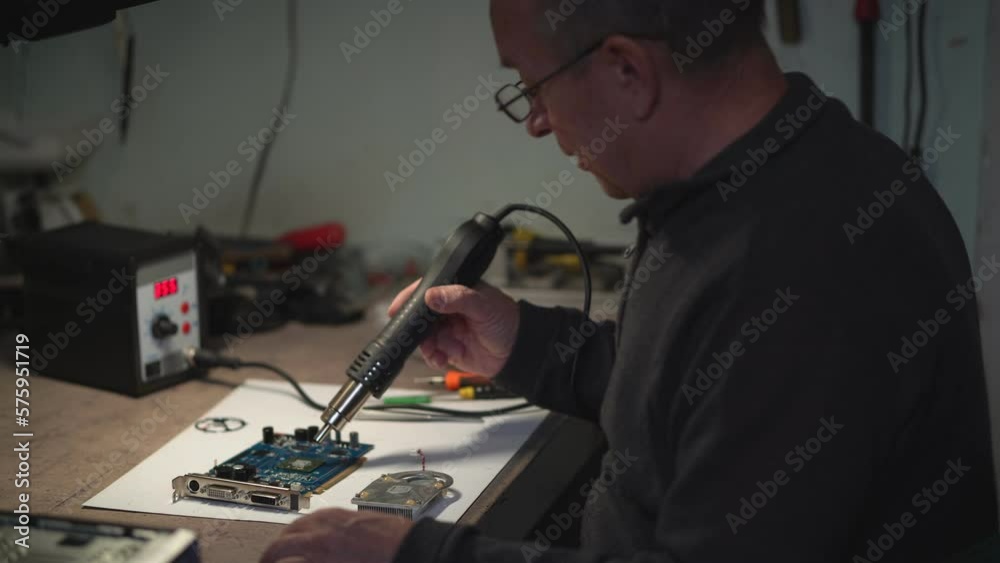 video card repair with a soldering station. chip replacement. chip heating. repair after cryptocurrency mining. High-quality shooting in 4k format video card repair with a soldering station. chip replacement. chip heating. repair after cryptocurrency mining. High-quality shooting in 4k format
