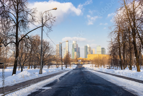 view of skyscrapers of Moscow city district from park on Poklonnaya Gora on sunny winter day