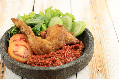 Ayam Penyet or Penyetan Ayam, Fried Chicken Served with Spicy Sambal