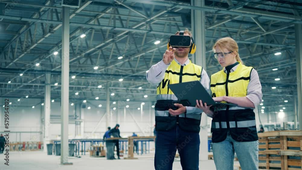 Employees using virtual reality. VR, 3d reality at industrial factory facility.