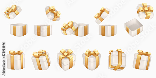 Set of white gift boxes with gold ribbons and bows, isolated.