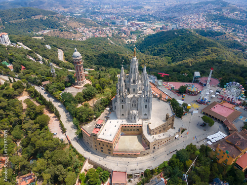 A panoramic bird's eye view of the Temple of the Sacred Heart of Jesus, Tibidabo Amusemsnt Park, and Tower of the Waters of Two Rivers, Barcelona, Spain photo