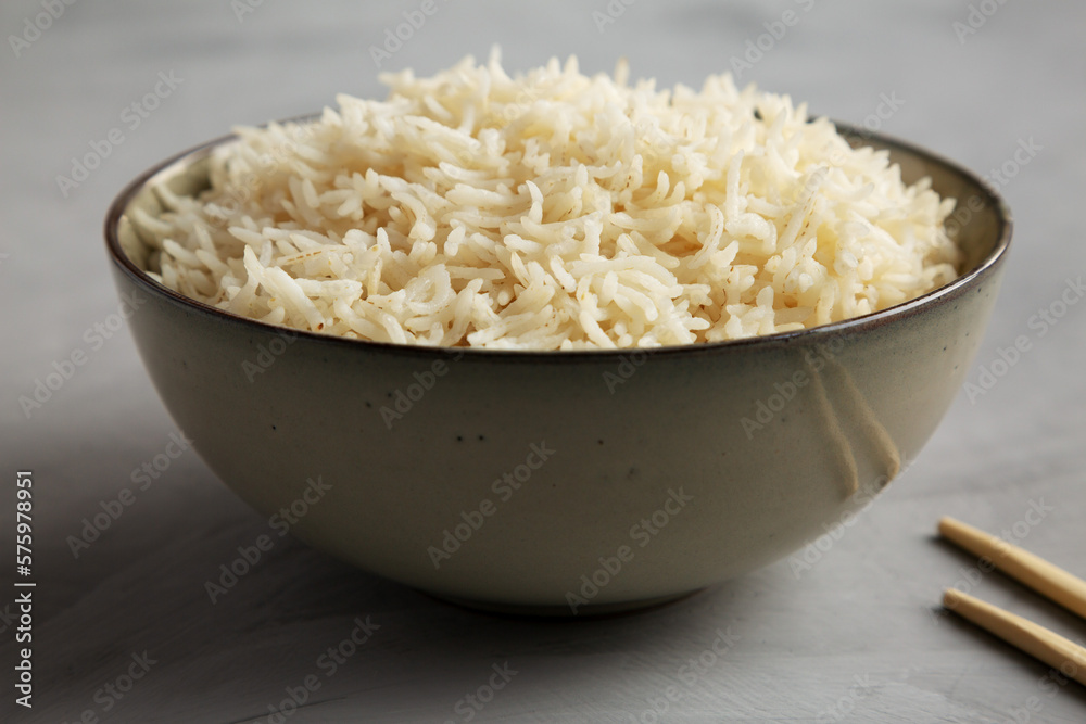 Homemade Cooked Basmati Rice in a Bowl, side view. Homemade Cooked Basmati Rice in a Bowl, side view.