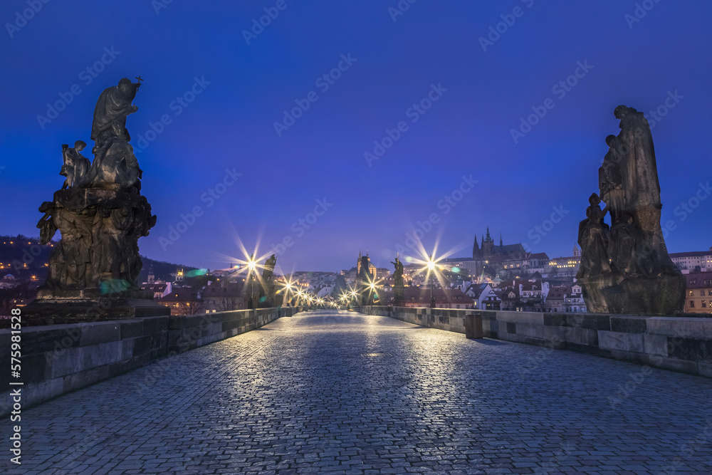 Charles Bridge, Prague at dramatic evening, Czech Republic, with night lighting
