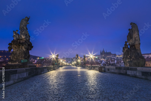 Obraz na płótnie Charles Bridge, Prague at dramatic evening, Czech Republic, with night lighting w salonie