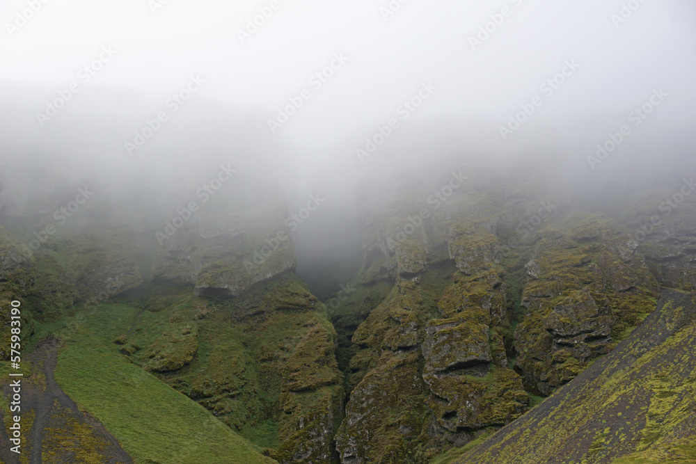 Rocks and fog at Raudfeldsgja Gorge on Snaefellsnes Peninsula in Iceland Rocks and fog at Raudfeldsgja Gorge on Snaefellsnes Peninsula in Iceland