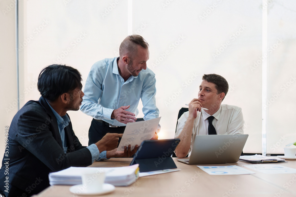 Obraz premium Group of Business financial with finance reports to analyze big data, balance sheet, strategy at meeting room.