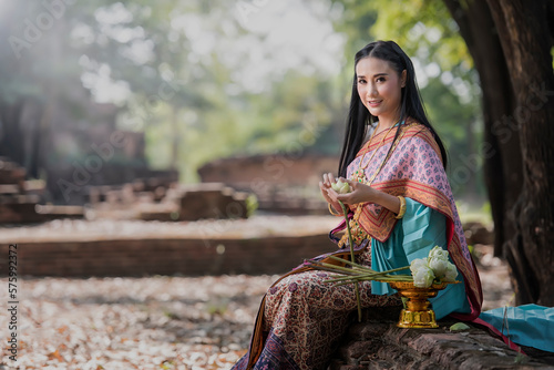 Beauty fantasy Thai women. Beautiful Thai girl in traditional dress costume , Ayutthaya province, Thailand. Asian women wearing traditional Thai culture, vintage style, Thai