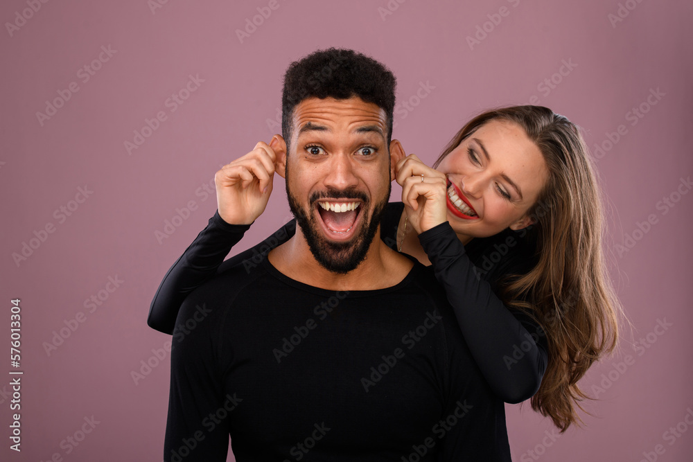 Portrait of young multiracial couple, studio shoot. Portrait of young multiracial couple, studio shoot.