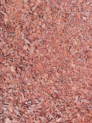 red wood pieces on the ground 