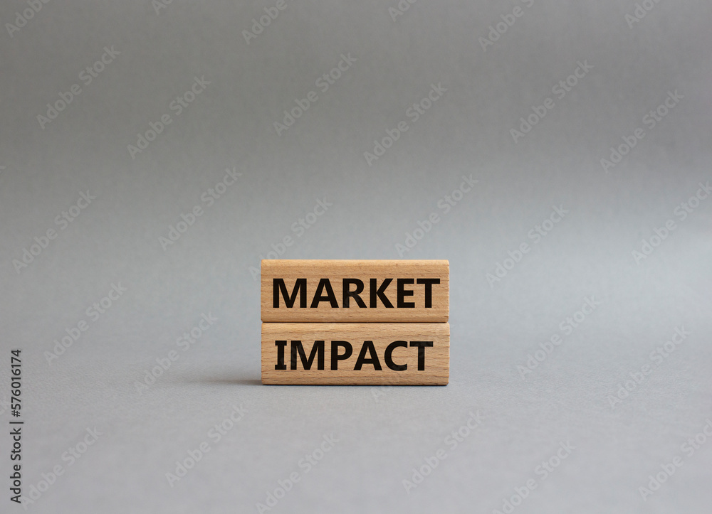 Market impact. Concept word Market impact on wooden cubes. Beautiful grey background. Business and Market impact concept. Copy space. Market impact. Concept word Market impact on wooden cubes. Beautiful grey background. Business and Market impact concept. Copy space.