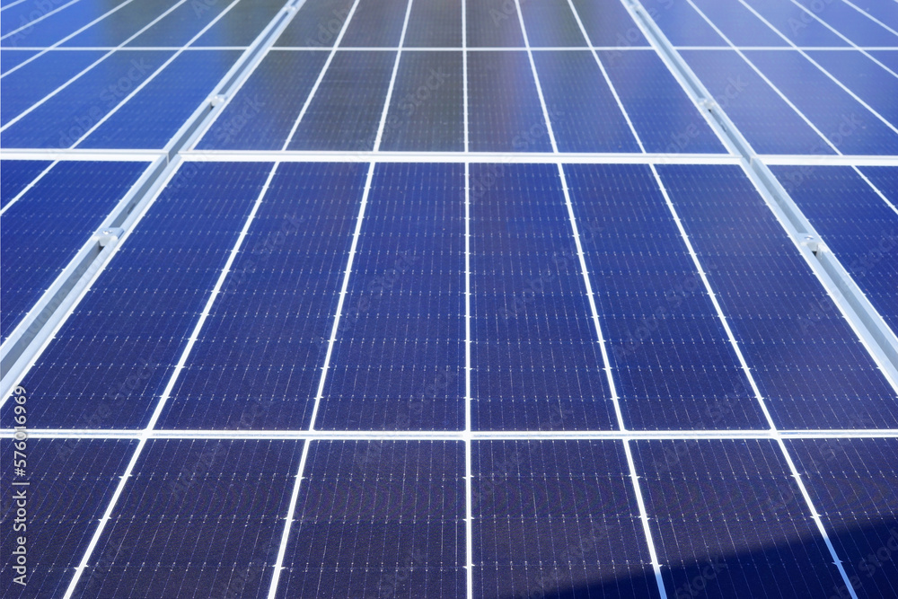 Close up of front view blue solar panel. Solar cell technology, Power cell alternative source of electricity. Photovoltaic cell panel. Clean energy power concept Close up of front view blue solar panel. Solar cell technology, Power cell alternative source of electricity. Photovoltaic cell panel. Clean energy power concept