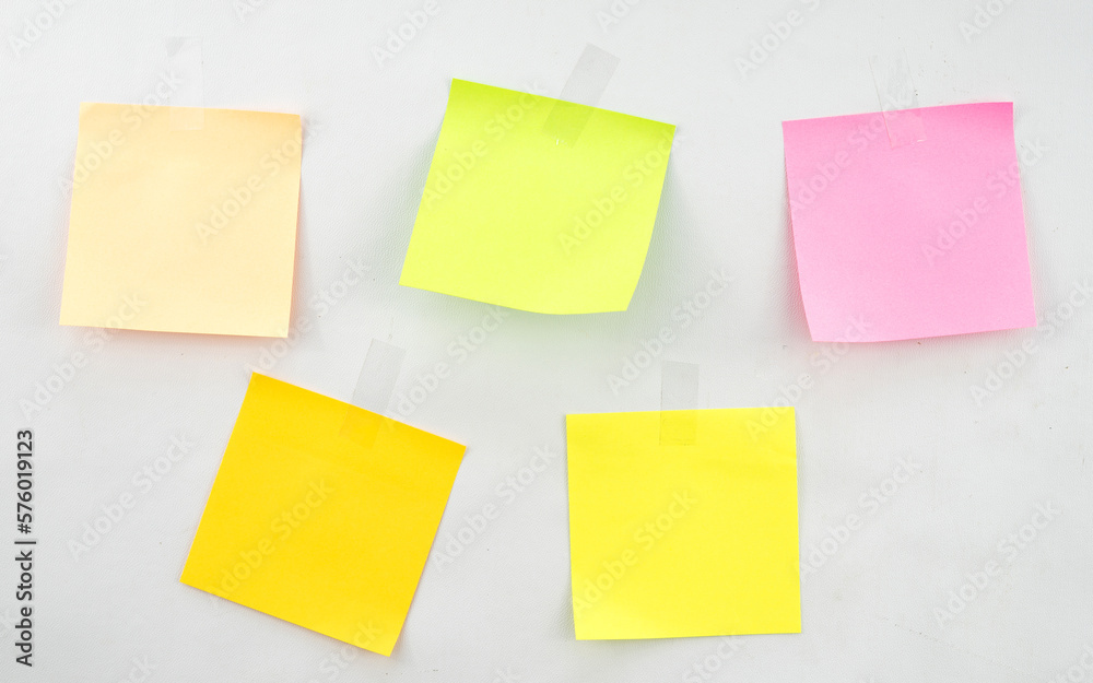Set of blank sticky note paper pasted with transparent tape Set of blank sticky note paper pasted with transparent tape