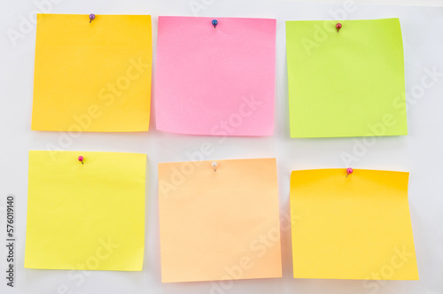 Blank of pastel sticky note with Needle