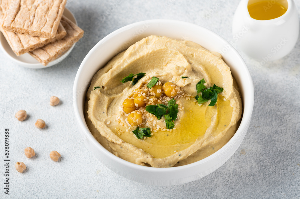 Hummus with crispbread. Healthy snack. Vegetarian food. Chickpea hummus Hummus with crispbread. Healthy snack. Vegetarian food. Chickpea hummus