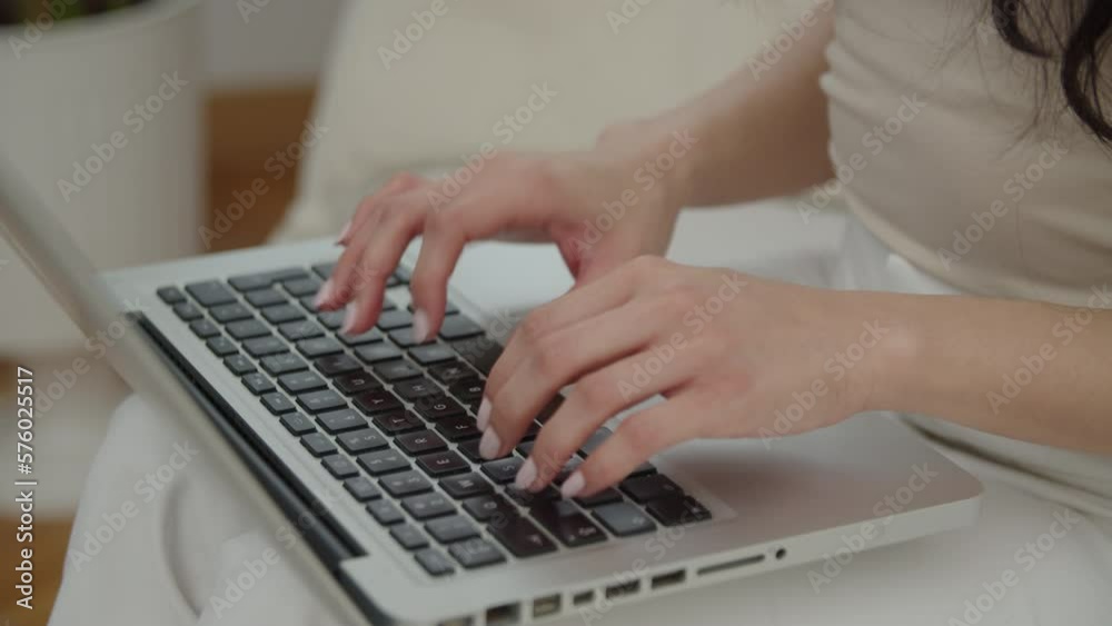 Close up of female hands pressing keys of laptop keypad. Close up of female hands pressing keys of laptop keypad.
