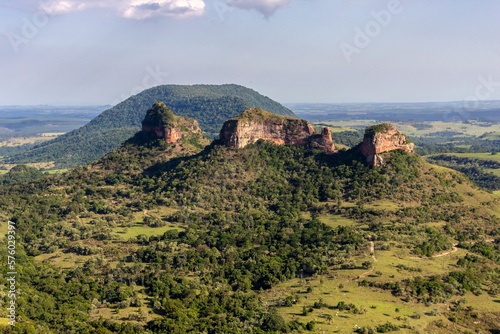 View of the rock formation known as Três Pedras, a set of testimonial hills, located in the rural area of the municipality of Bofete, tourist region of Polo Cuesta, interior of São Paulo, Brazil photo