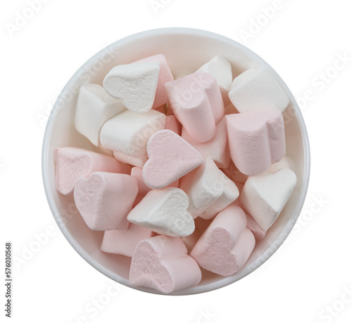 Marshmallow in a white plate on a white background. View from above