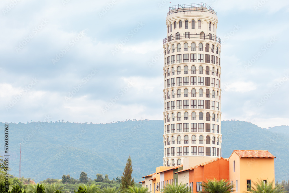  Pisa tower in Thailand Khao Yai valley, surrounded by lush greenery