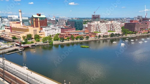 Cambridge Kendall Square skyline and Longfellow Bridge aerial view, Boston, Massachusetts MA, USA. The bridge connects Cambridge and Boston over Charles River is a steel rib arch bridge built in 1906. photo