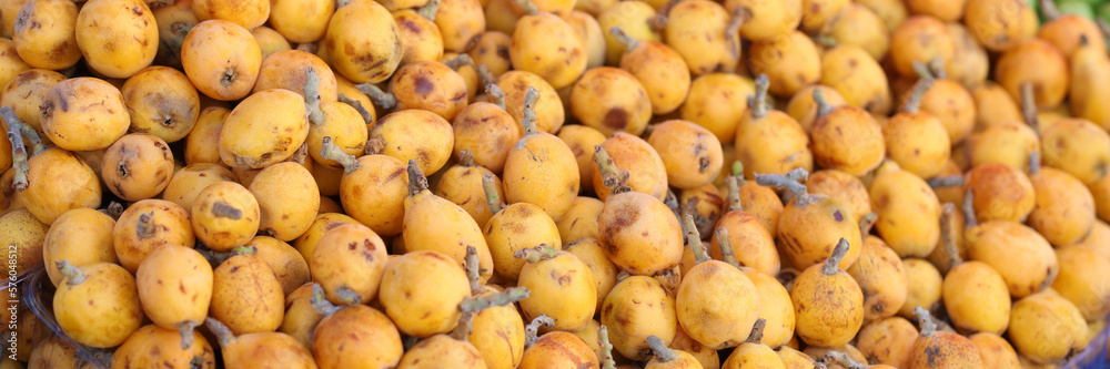 Lots of ripe fresh yellow ripe pears on market closeup Lots of ripe fresh yellow ripe pears on market closeup