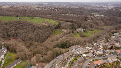 Aerial drone photo of the Village of Netherton near Huddersfield, in the Kirklees metropolitan borough of West Yorkshire, England showing the residential houses in the winter time photo