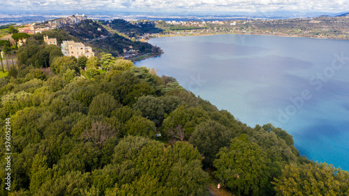Aerial view of Lake Albano, a small volcanic crater lake in the Alban Hills of Lazio, south of Rome, Italy. Castel Gandolfo, overlooking the lake, is the site of the Papal Palace of Castel Gandolfo.