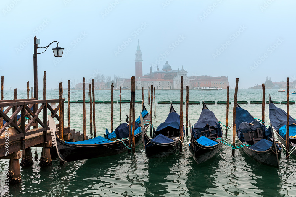 Gondolas on Grand Canal as San Giorgio Maggiore church on background in Venice, Italy.