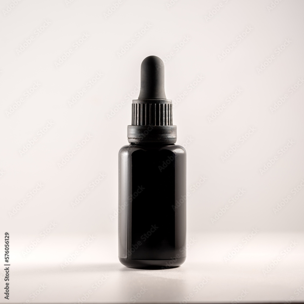 Essential Oil Bottle on White table and white Background Essential Oil Bottle on White table and white Background