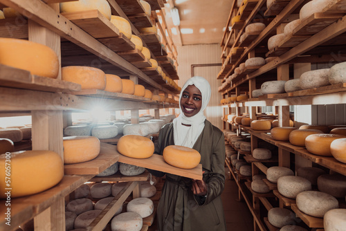 Arab investor in a warehouse of the cheese production industry