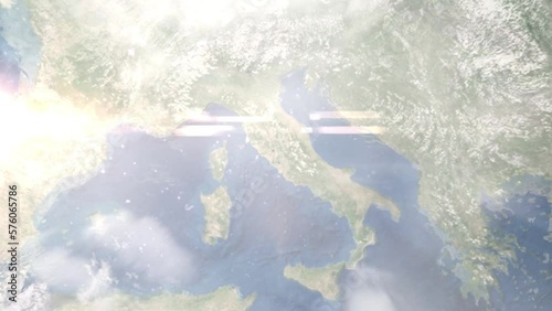 Earth zoom in from outer space to city. Zooming on Viterbo, Italy. The animation continues by zoom out through clouds and atmosphere into space. Images from NASA