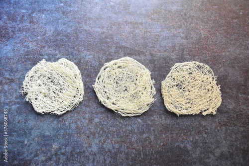 Raw whole dried round string hopper rice noodles