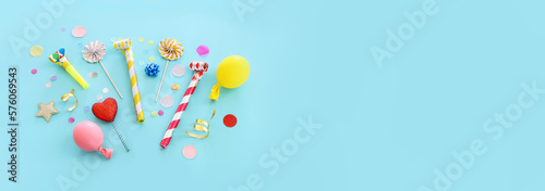 Top view image of party and present objects on pastel background