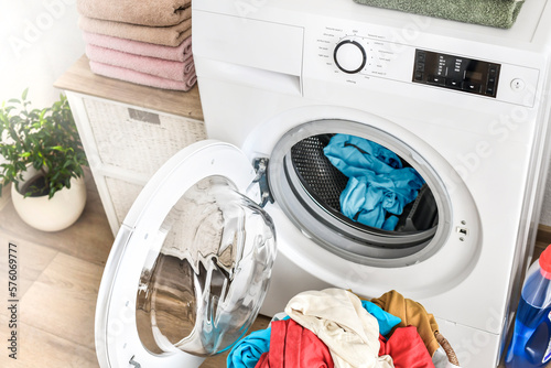 laundry room with a washing machine