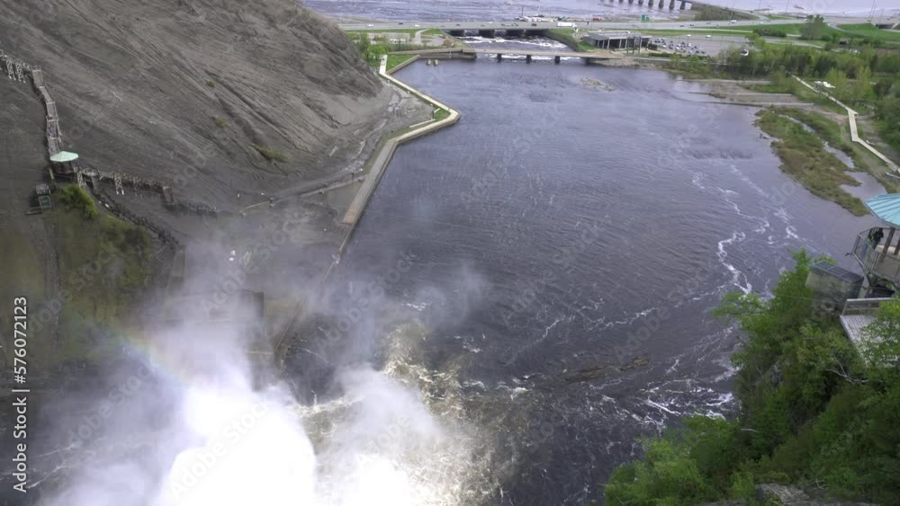 The Montmorency Falls (Chute Montmorency) large waterfall on Montmorency River where it drops into the Saint Lawrence River in Quebec, Canada. Protected within Montmorency Falls Park.