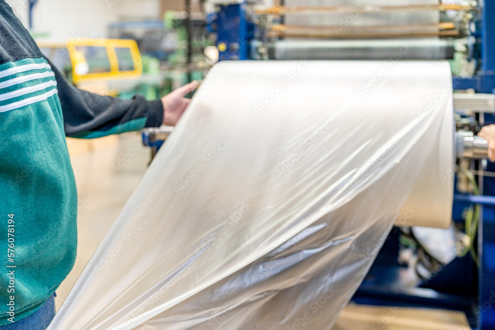 plastic roll in a factory for the production of plastic products plastic roll in a factory for the production of plastic products