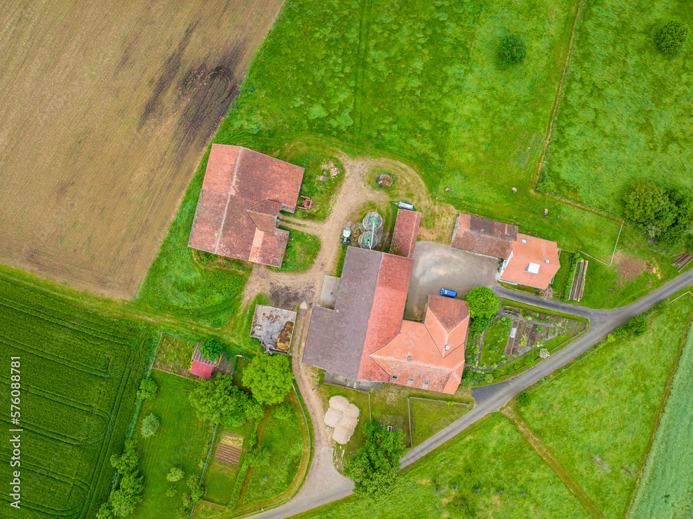 Aerial view of farm buildings in rural area in Switzerland. Aerial view of farm buildings in rural area in Switzerland.