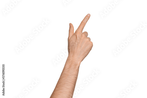 A man's hand points the direction with his finger. Points diagonally to the side.  Index finger pressing something. Isolate on a white background. photo
