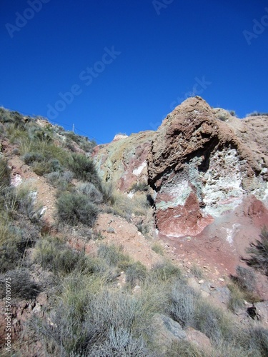 exposed minerals on mountainside photo