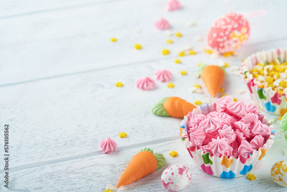 Sweet Easter concept. Sweet Easter kids holiday assortment marshmallows rabbit, chocolates easter eggs, candies, bunny, snacks on white wooden background. Flat lay Easter decoration idea. Mock up. Sweet Easter concept. Sweet Easter kids holiday assortment marshmallows rabbit, chocolates easter eggs, candies, bunny, snacks on white wooden background. Flat lay Easter decoration idea. Mock up.